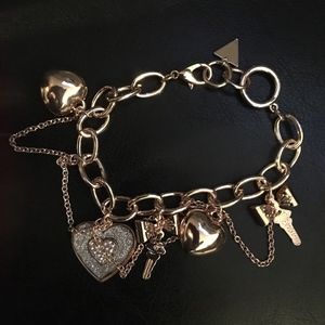 Guess Pave Hearts, bows & Keys Rose Gold Bracelet